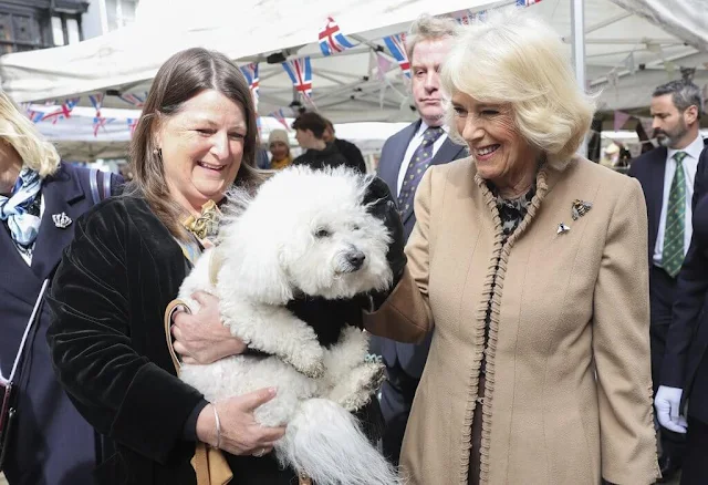 Queen Camilla visited the recently restored Shrewsbury Flaxmill Maltings. Queen Camilla wore a camel coat and fly and bee brooch