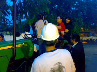 Flood in Sunter Agung Podomoro, North Jakarta, on February 2008, To accompany the official employees go home with John Deere farm tractor