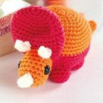 http://www.topcrochetpatterns.com/free-crochet-patterns/amigurumi-dinosaurs