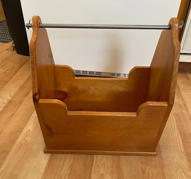 Photo of a thrifted wooden tote or caddy.