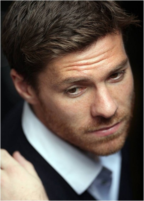 Xabi Alonso he is gorgeous but in this picture he is very charming