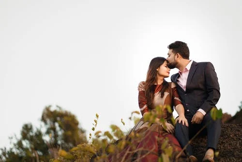 Romantic Couple, Beautiful couple Kissing in moutons