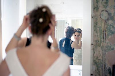 Helena fitting a vintage wedding dress and accessories for a client at Heavenly Vintage Brides