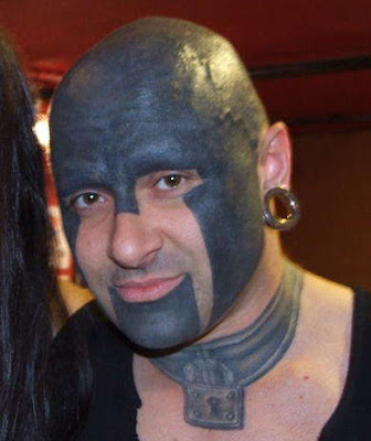 Here are a couple of new facial tattoos I found that I haven't seen before.