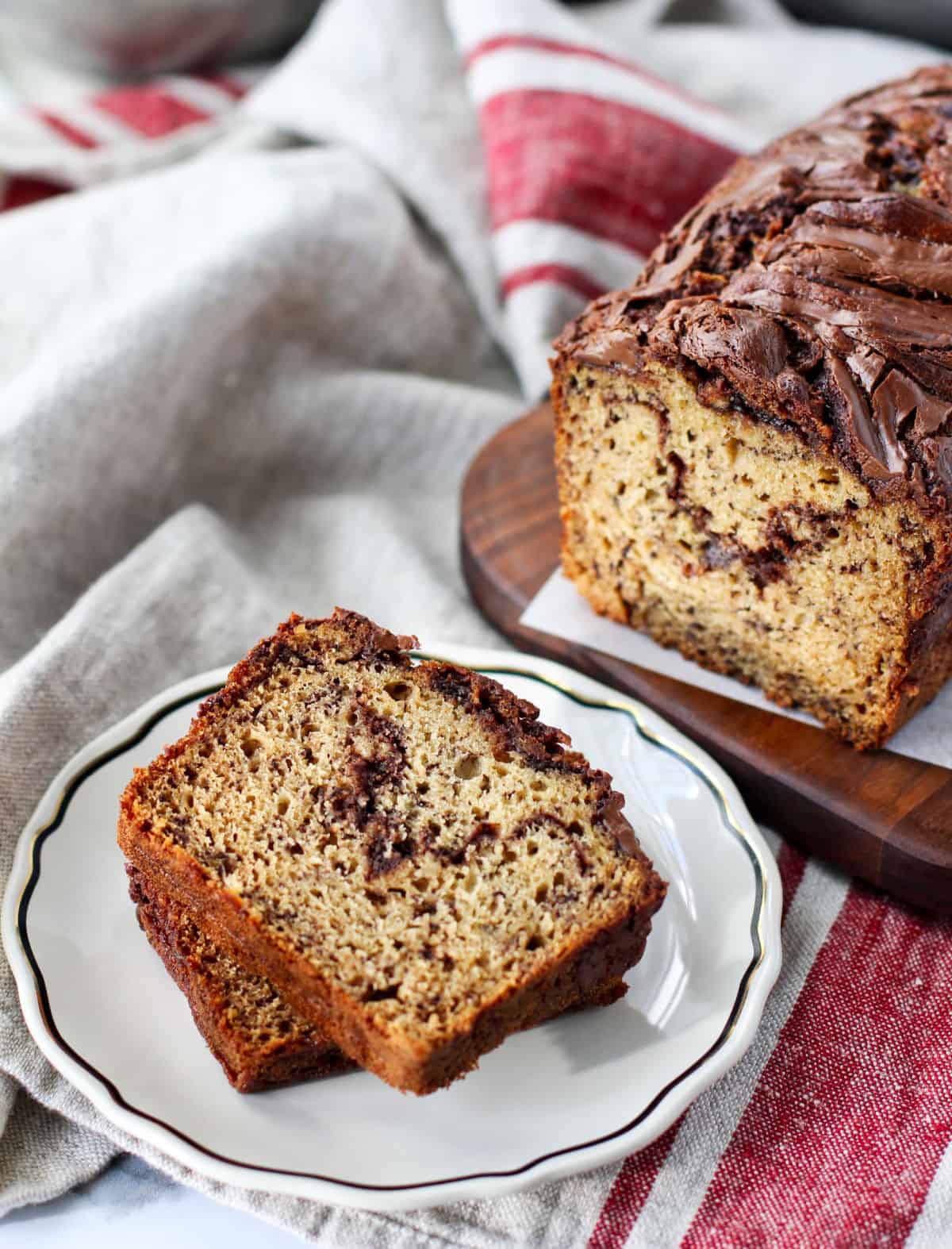 Banana Bread with Swirls of Nutella on a plate.