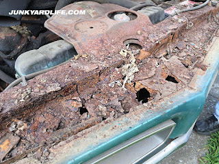 Rusty core support on the 1966 Pontiac Tempest. Probably combination of leaky battery acid an rats' nests.