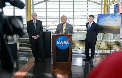 A photo of NASA Administrator Charles Bolden, David Melcher and Jaiwon Shin