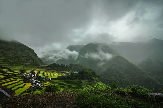 Beautiful Batad Rice Terraces during afternoon rain and fog