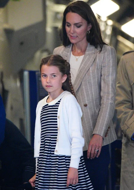 The Princess of Wales wore a single-breasted beige blazer by Blaze Milano. Princess Charlotte wore a stripe dress