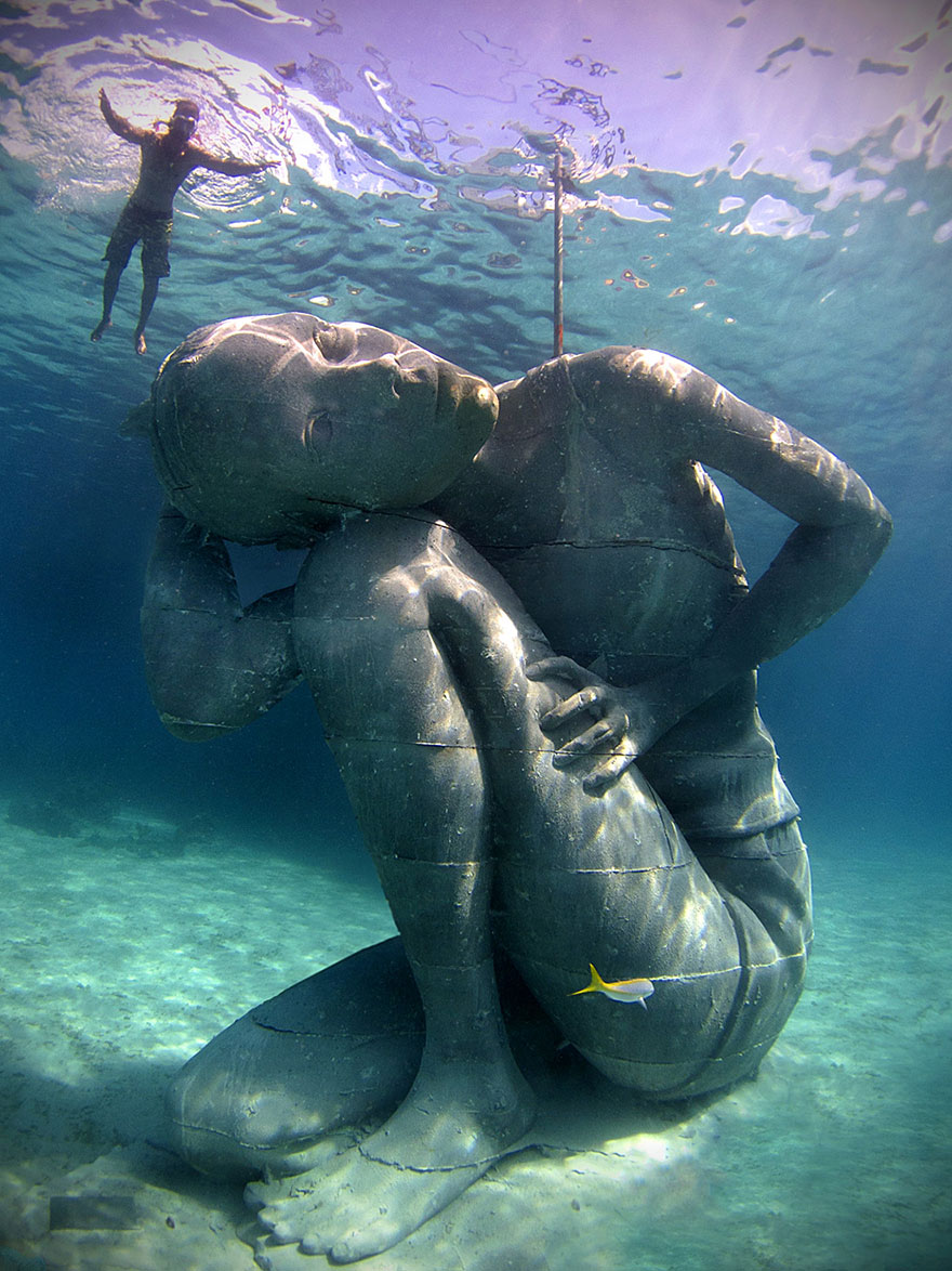 42 Of The Most Beautiful Sculptures In The World - Ocean Atlas: Massive Underwater Statue Of Girl Carrying The Ocean On Her Shoulders