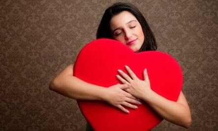 Importance of Self-Compassion  - woman girl hug hugging heart big tedy red carry hold