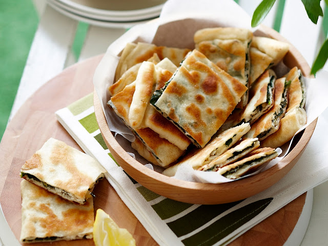Barbecued spinach gozleme cut into pieces