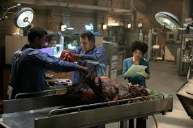 FRINGE: Walter (John Noble, C) works with Peter (Joshua Jackson, L) and Astrid (Jasika Nicole, R) to examine evidence in the FRINGE episode The Transformation