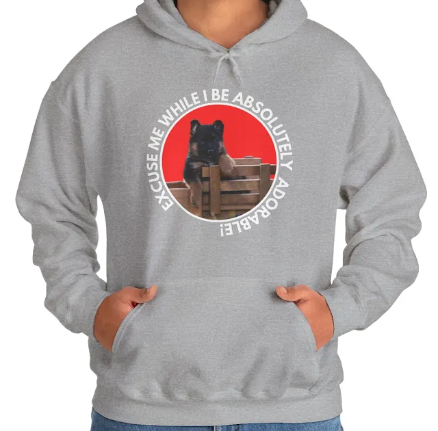 A Hoodie With Cute Black and Red German Shepherd Puppy Sitting on the Toy Wooden Tractor and Caption Excuse Me While I Be Absolutely Adorable