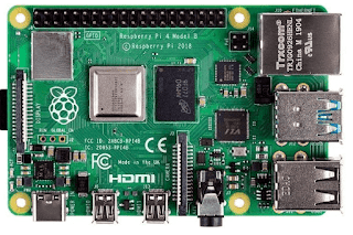 Raspberry PI HDM shows and four USB port and cable for sound coming out and green coloured