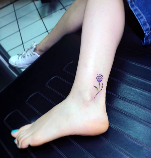 It’s beautiful and cute simple small rose flower tattoo design ideas for girl on the ankle.