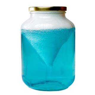 Wow the kids and make a tornado in a jar!  This simple science activity is great for kids of all ages and contains the mess- gotta love that! #sciencefairprojects #scienceexperimentskids #scienceexperiments #tornadosciencefairproject #tornadoinabottle #tornado #tornadoinajar #tornadoexperiment #growingajeweledrose