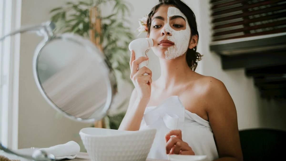 Woman Using Electric Exfoliating Brush