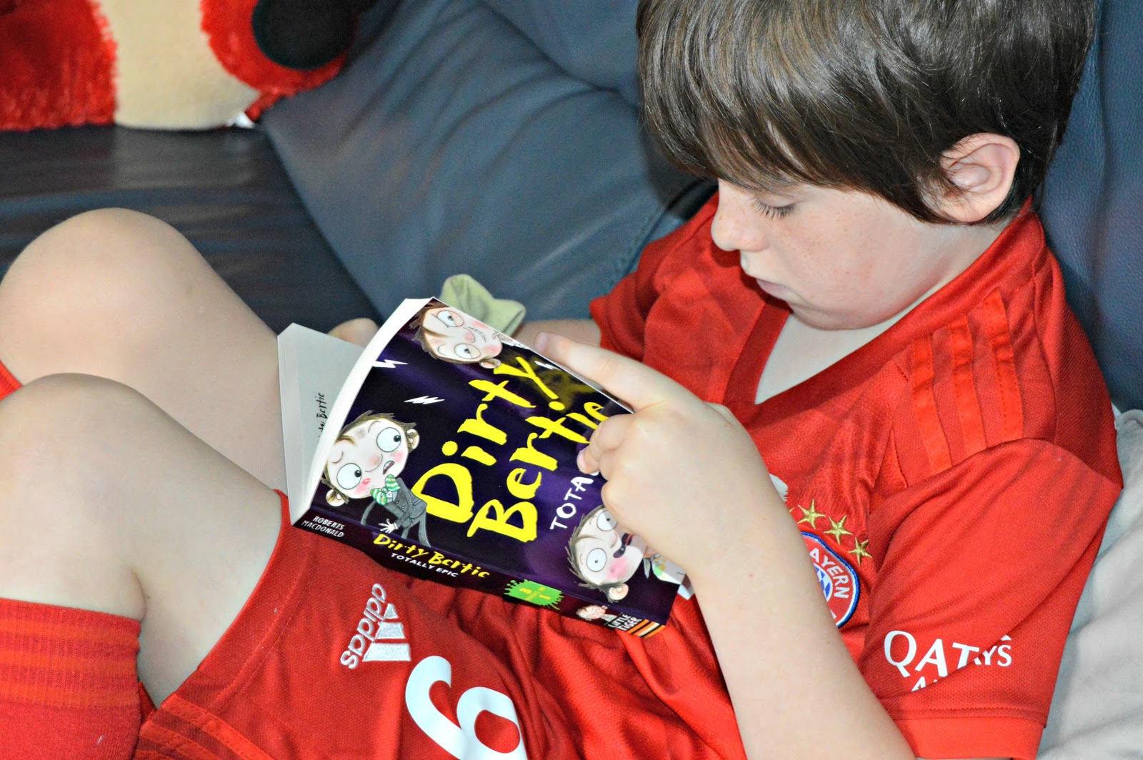 boy reading a book