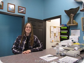 Friendly salesperson at fish processing center in Soldotna, AK
