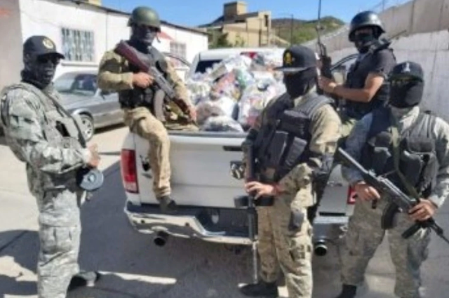 GALAERIA: Sicarios de la Gente Nueva  Cártel de Sinaloa repartieron despensas en Chihuahua con la imagen de Bin Laden