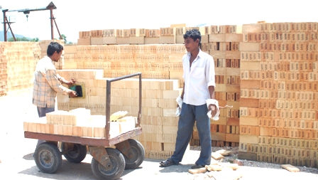 Refractory Bricks being stacked - representative image