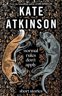 Cover for book "Normal Rules Don't Apply" by Kate Atkinson. A golden fox and a silver dog, curled nose to tail, with a pattern of golden branches, fruits and leaves behind.