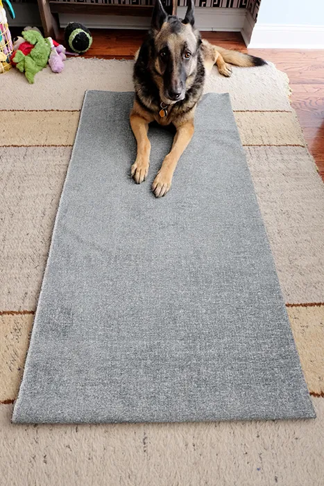 laying out fabric for tufted floor cushions