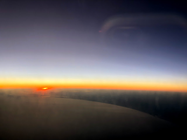 A sunset from the plane