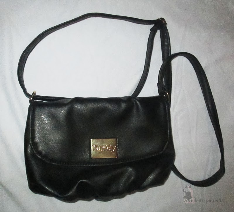 http://www.passarela.com.br/feminino/produto/6351192312/Bolsa-Transv-Dariely-3825----Preto/