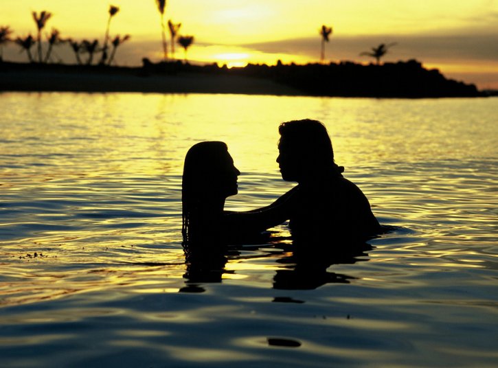 sunset love quotes. couple kissing sunset.