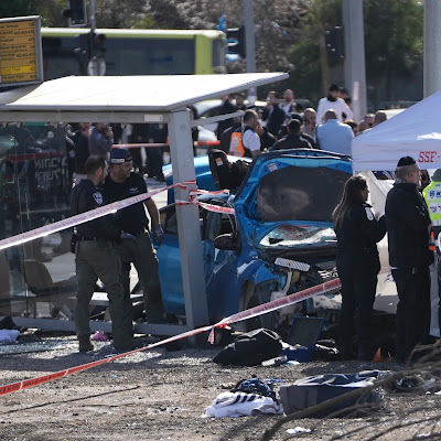 Palestinian driver ploughs into bus stop killing two Israelis