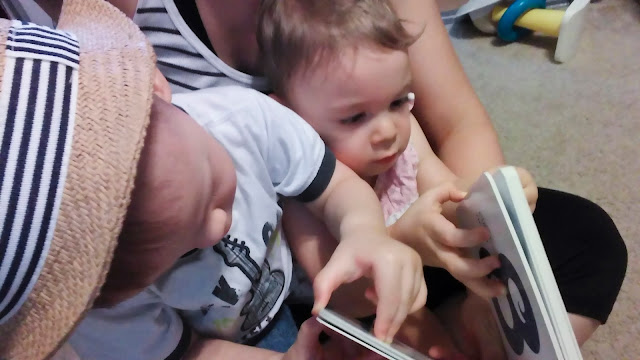 Mommy and Babies Reading