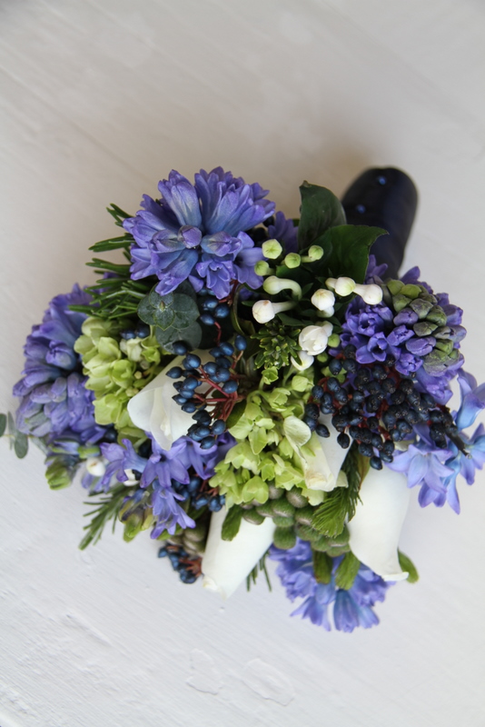 A Spring Wedding Bouquet to tone with Navy Blue Bridesmaids gowns 