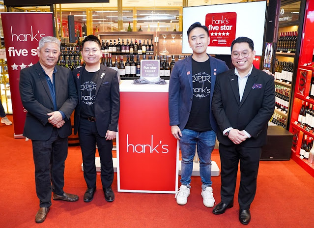 (From left) Roderick Wong, Honorary President of SOMLAY; Hans Ong, Manager of Hank’s; Daniel Teng, Deputy Chief Executive Officer of Jaya Grocer and Ronald Willie Binati, President of SOMLAY, posing with Hank’s Five-Star Wines label at a wine tasting party to celebrate the “new” Hank’s at the Intermark, Kuala Lumpur on Sept 20.