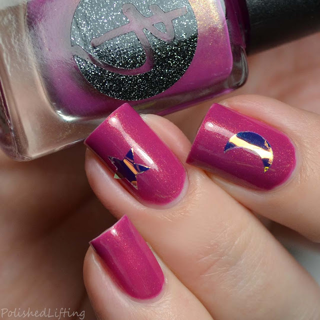 berry nail polish with nail art stickers