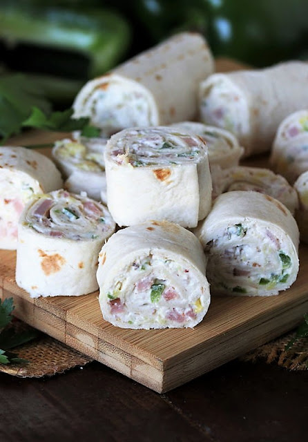 Pineapple-Ham Tortilla Roll-Ups on Serving Board Image