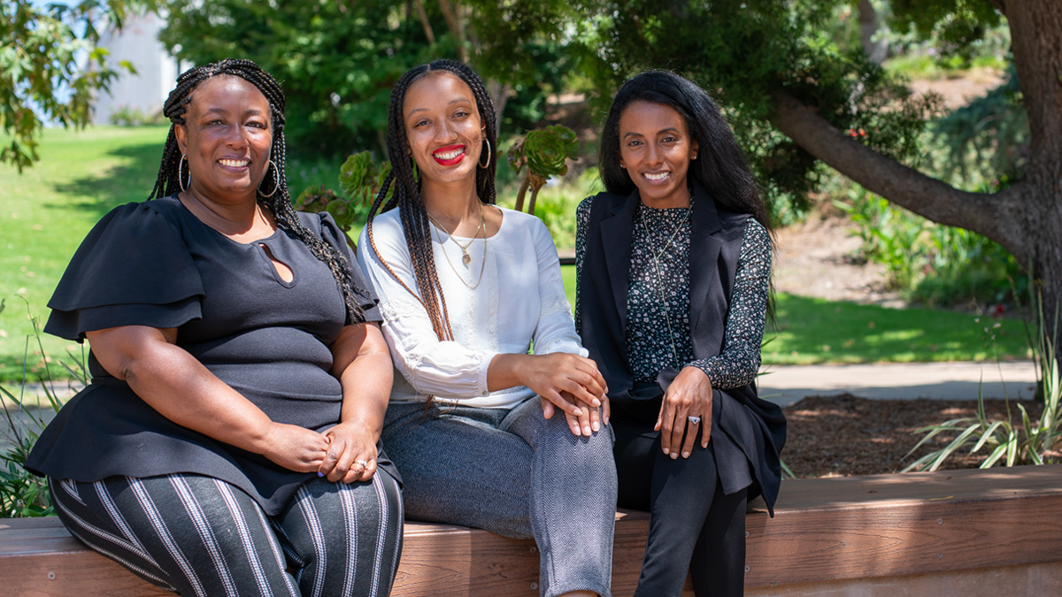 Candea Mosley, Myra Hollis and Sesen Negash