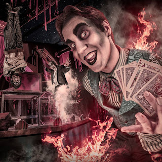 Black Magic Promo Image with Houdini Character in front, fire and other tricks in the background