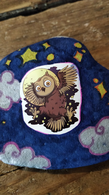 augmented reality owl sticker on decorated rock