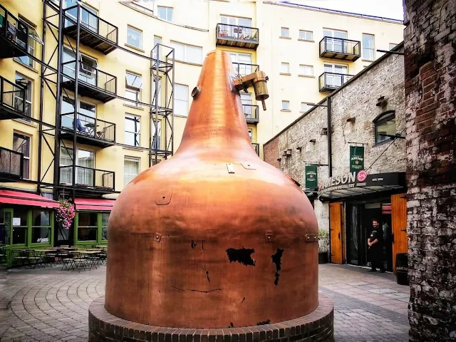 Copper still outside Jameson Distillery Bow St. in Dublin Smithfield