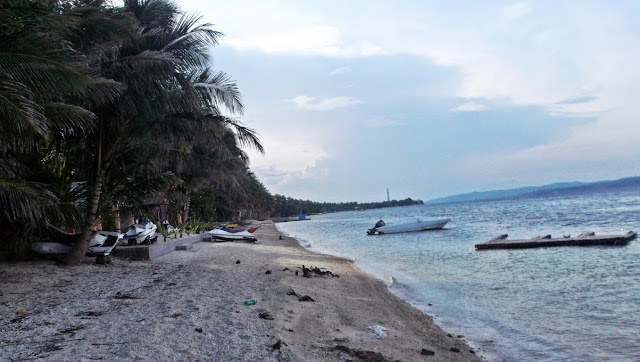 white beach with a surprising number of parked water toys at San Antonio, Dalupiri Island, Northern Samar