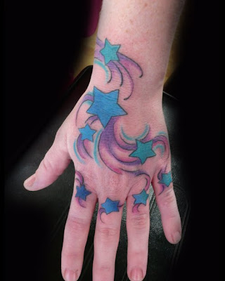 hand tattoos, star tattoos, tattoo designs, tattoos for girls, 