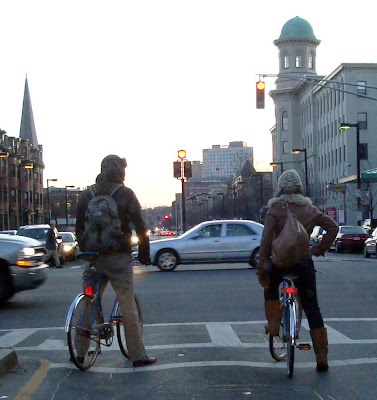 cold weather riders man woman bike date Boston