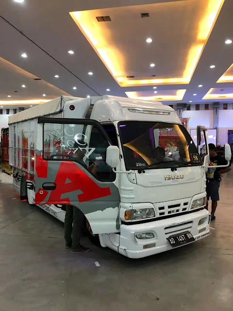 isuzu elf harga