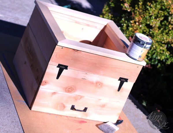 Flower box with door for storage
