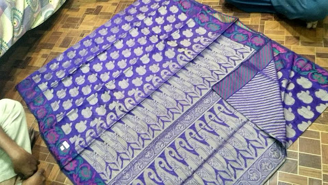 thread work buta with checks and zari border saree