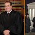 Individuals Pray before the US Supreme Court after the demise of Justice Antonin Scalia