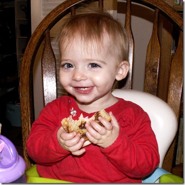 Elaine eating Grilled Cheese sandwich