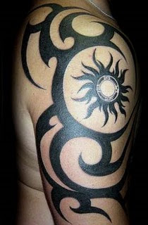 Superb Tribal Tattoo Design On His Arm 